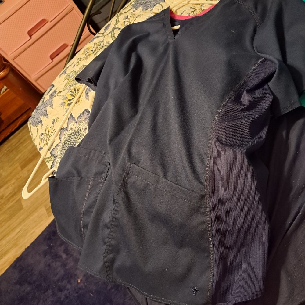 Navy blue scrubs with bottoms. This is a complete set